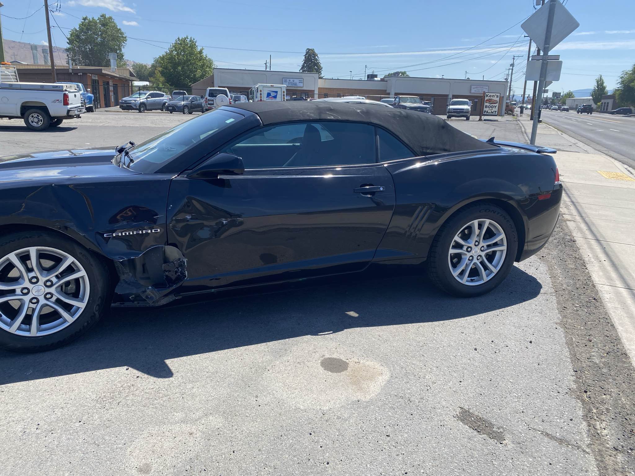 vehicle with severe side impact damage before repair